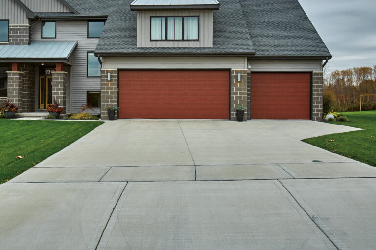 How to remove oil stains from concrete driveway?